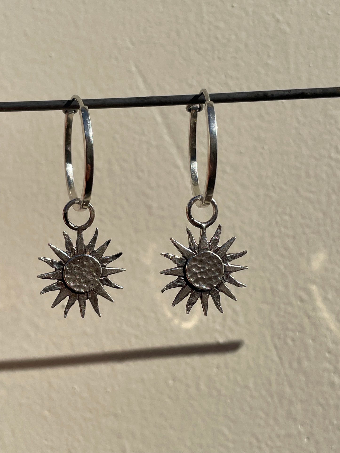 Aros con dijes sol